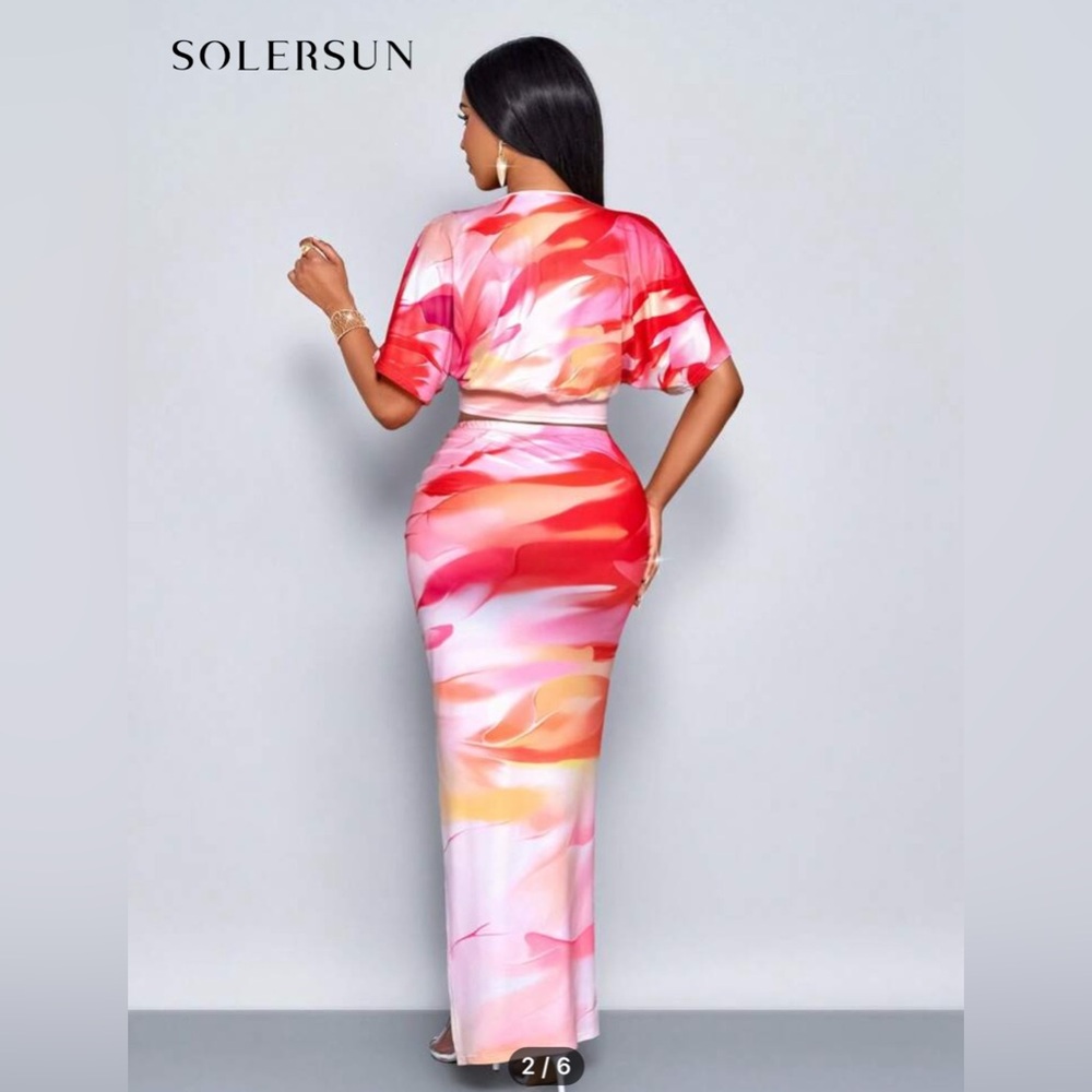 Solar sun, two-piece outfit brand new, never worn with tags.